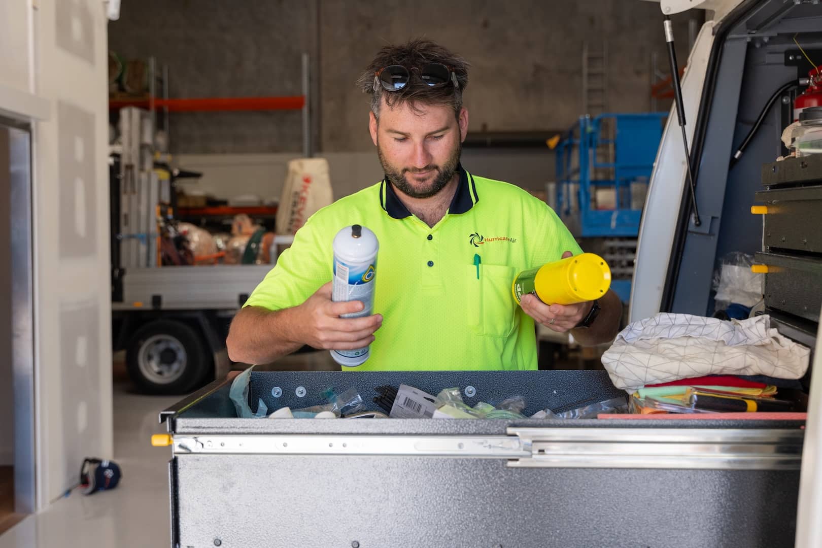 man with tools to service air con